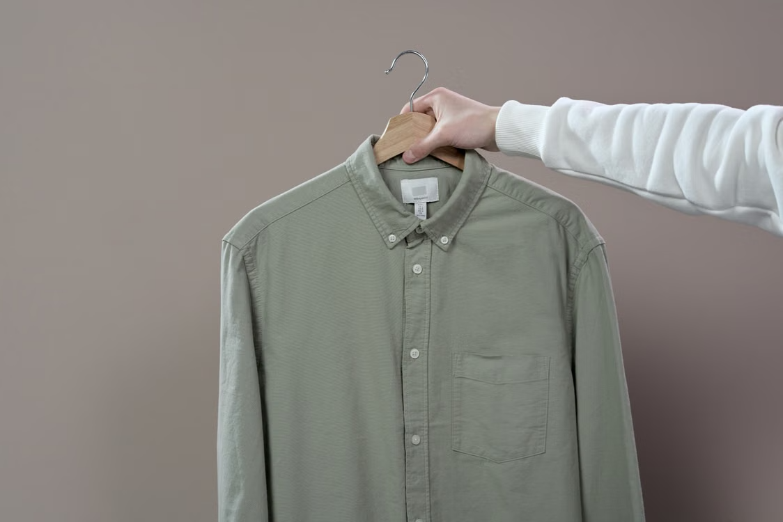 Unbranded shirt sample on a hanger ready for version review