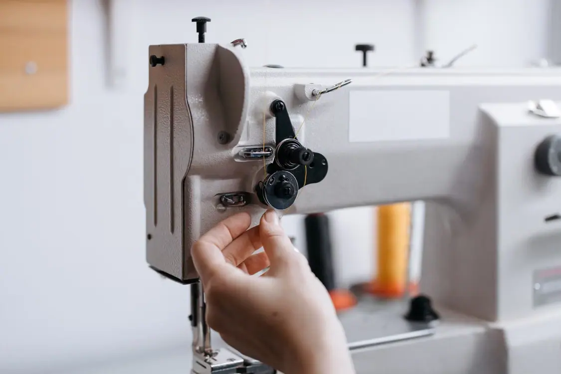 Industrial sewing machine prepared for textile production